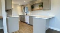 Kitchen with bar stool area