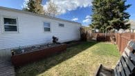 side of home and garden beds